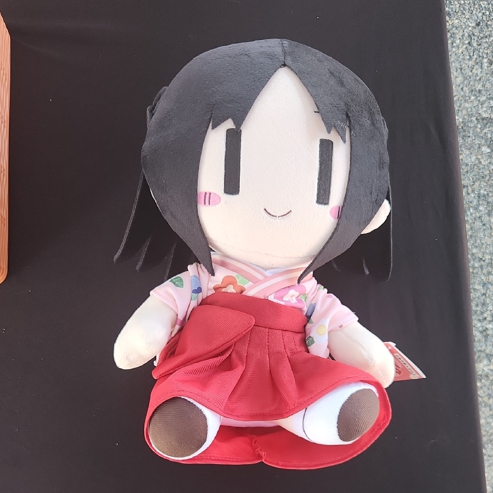 Tai Red and Black Stuffed Animal Plush